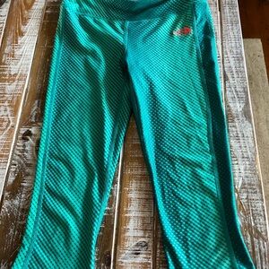 The North Face Women’s Aqua and Red Leggings